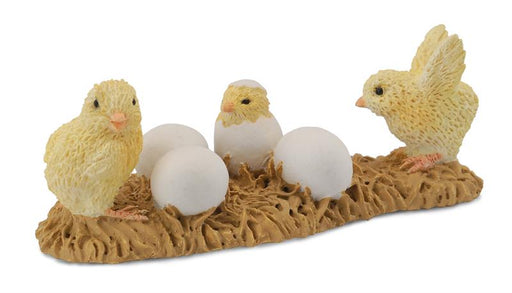 Baby Chickens on nesting straw toy figurine
