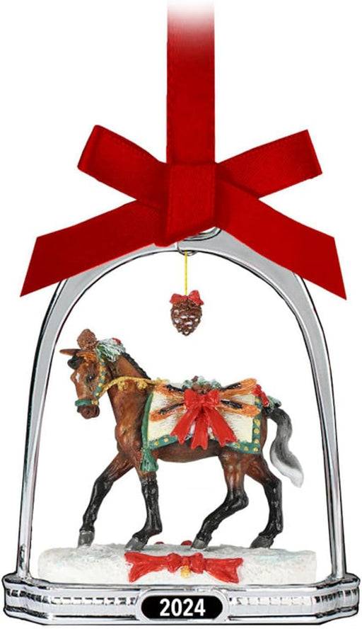 Add the snowy magic of our 2024 Holiday Horse to your Christmas tree in miniature! Housed in a silver-toned stirrup, a finely-detailed miniature of AprÃ¨s Ski strides through the glittering snow.