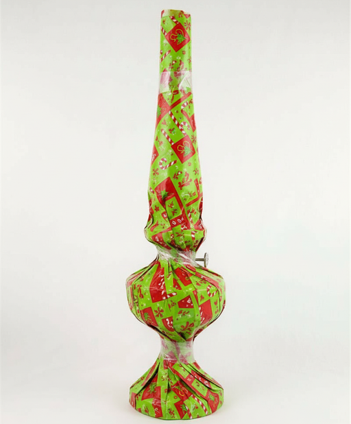 Aladdin kerosene lamp fully wrapped in holiday paper