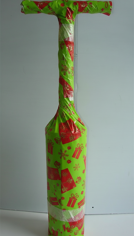 Aluminum Razor Clam Gun wrapped in generic holiday paper