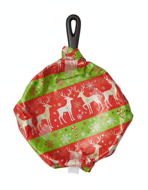 Lodge cast iron skillet wrapped in holiday paper