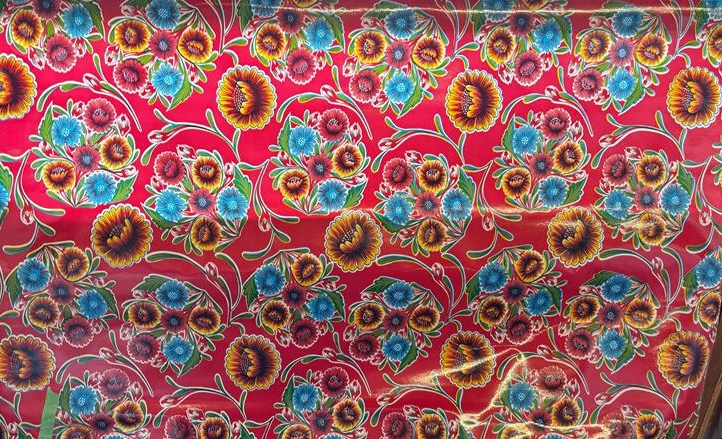 Blooms on Red Oilcloth Fabric Full Bolt - 12 Continuous Yards, 47.5" Wide