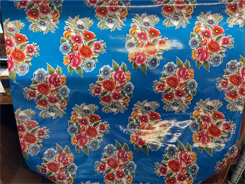 Ladybird on Blue Oilcloth Fabric by the Yard, 47.5" Wide