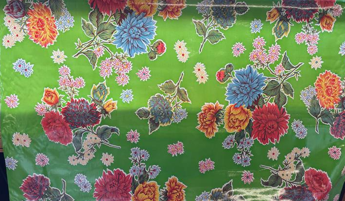 Mums on Green Oilcloth Fabric Full Bolt - 12 Continuous Yards, 47.5" Wide