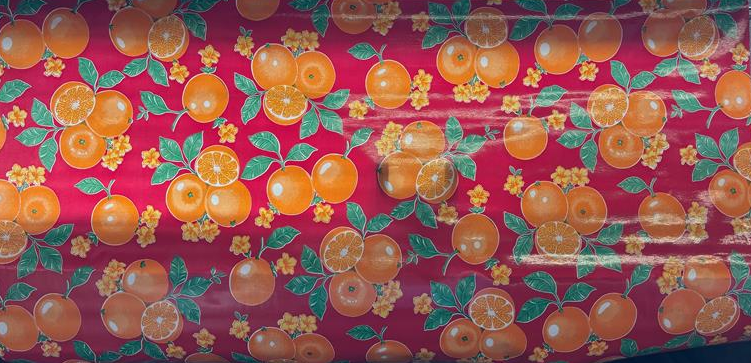 Oranges on Red Oilcloth Fabric by the Yard - 47.5" Wide