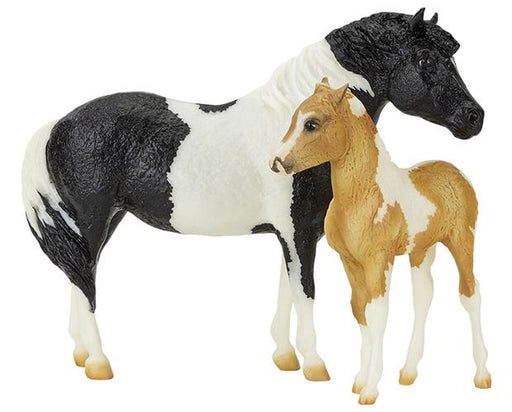 The sweet pair of the Phantom and Misty is presented on the original Misty and Stormy sculptures created by artist Chris Hess in the 1970s. To make this set even more special, its the first time Breyer has released models of the Phantom and of Misty as a